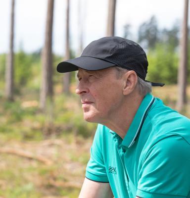 Man with thoughts in forest